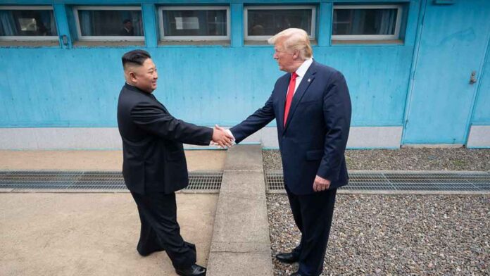 President Donald J. Trump shakes hands with Chairman of the Workers’ Party of Korea Kim Jong Un